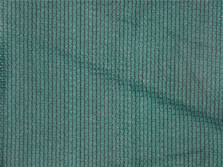 Σκούρο πράσινο μαύρο μονοπάτι από σκιά δίχτυ